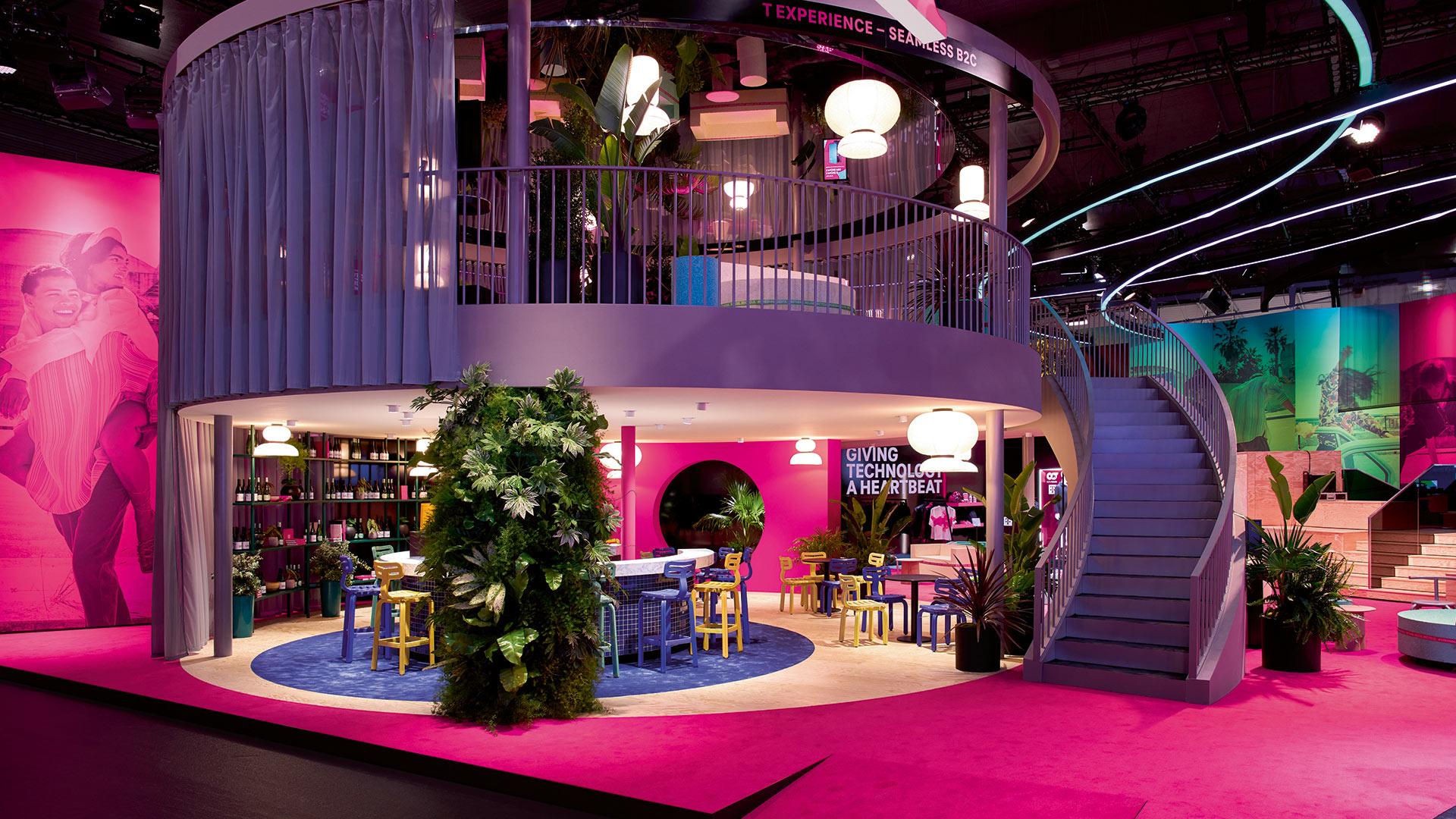 MWC 2023, Deutsche Telekom. Great hospitality gesture with bar and networking space for visitors. Sustainable furniture from recycled plastic and foam. Green Magenta. 