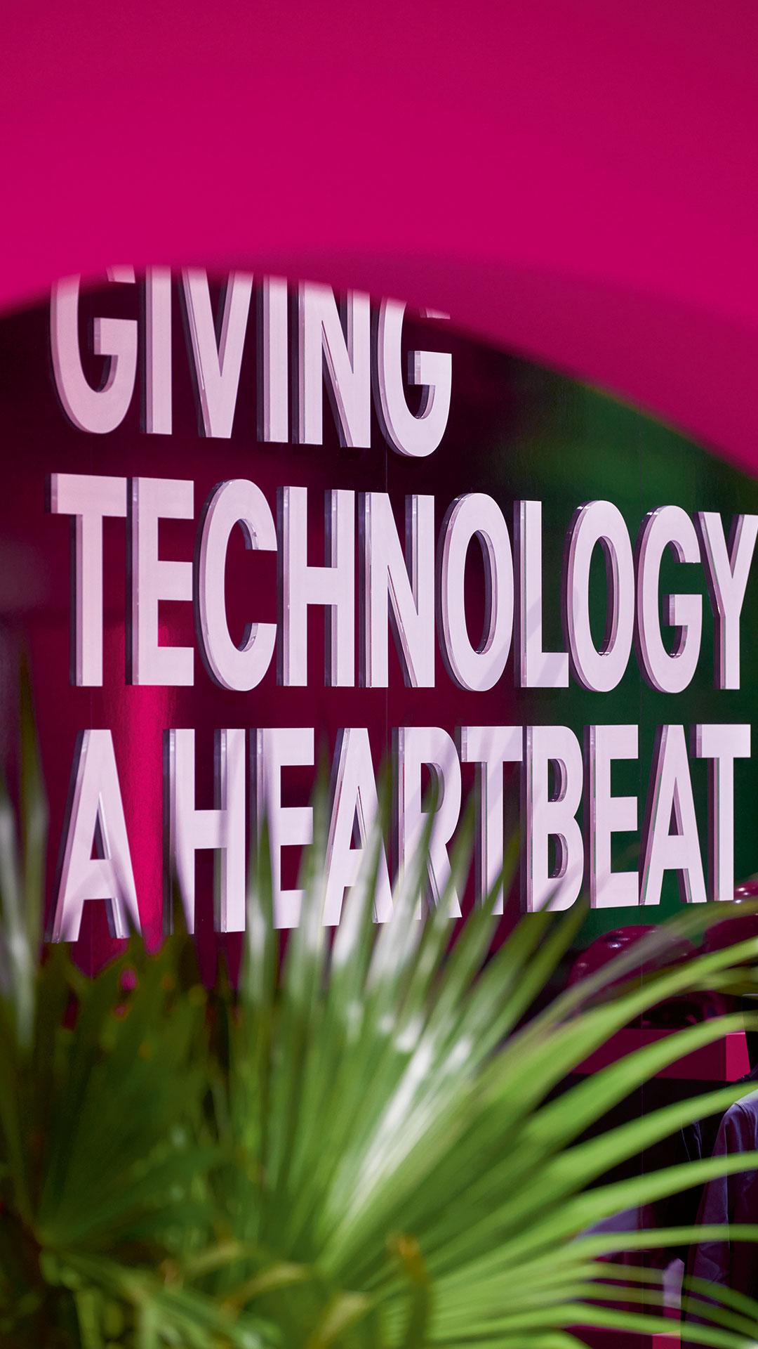 MWC 2023, Deutsche Telekom. Exploring a human-centered vision of Deutsche Telekom. Giving technology a heartbeat.